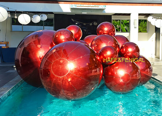 Gold, Black, And Red Inflatable Pvc Mirror Balloons As Water Art Installation